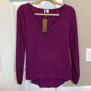 Francesca’s open back blouse